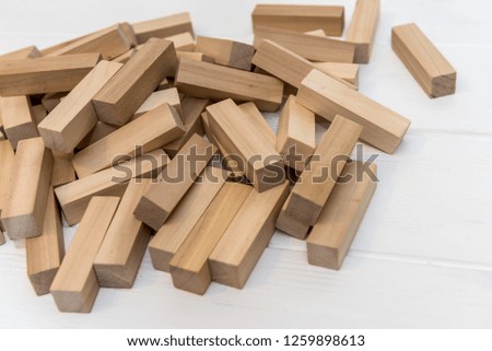 Wooden blocks for tower building on the desk