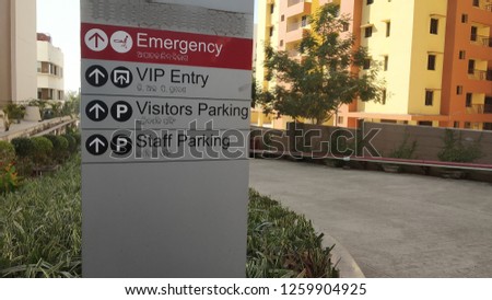 Hospital Outside Street Signs of Emergency, VIP Entry, Visitors Parking, Staff Parking