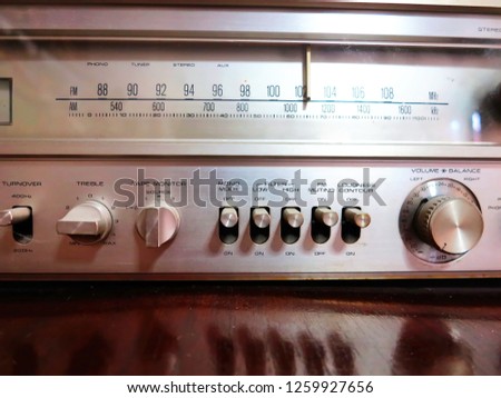 The old stereo receiver radio model which  was designed in the high classic model. This was a famous  brand named at that time.