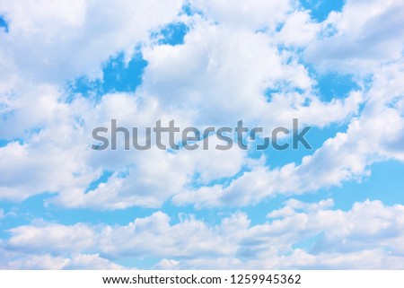Cloudiness - Blue sky and white cumulus clouds, may be used as background