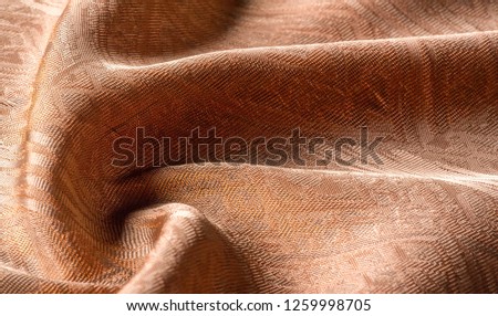 Picture. Texture, background. brown tapestry. From Santee Print Works, this cotton fabric is perfect for quilting accents, your design, décor. Colors include shades of tan and white.