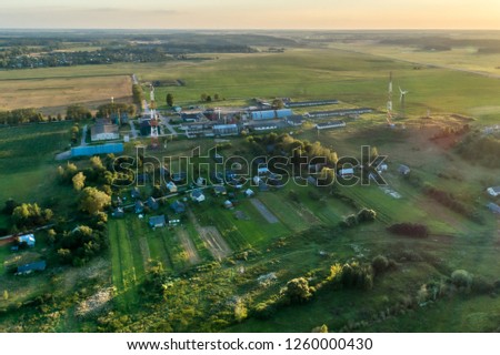 Russia, a typical rural settlement. Evening shot from the air.