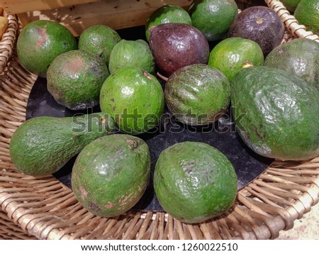 Avocado in a wooden basket