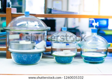 Desiccator in the analysis of total solids in water.  Royalty-Free Stock Photo #1260035332