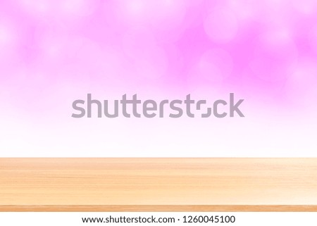 empty wood table floors on blurred bokeh soft pink white gradient background, wooden plank empty on pink bokeh colorful light shade, colorful bokeh lights gradient soft for banner advertising products