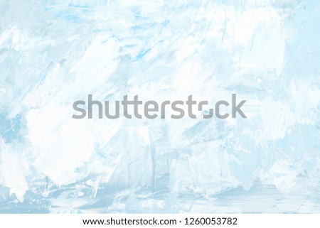 Painted blue and white background texture. Stained surface.