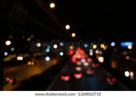 Abstract background with bokeh defocused lights in night city