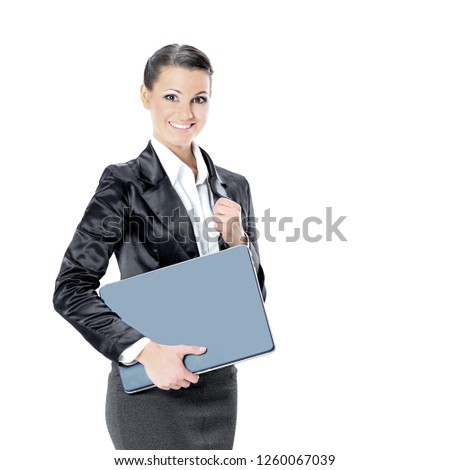 Beautiful young female entrepreneur holding laptop against white background.