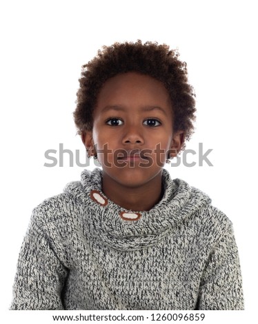 Beautiful Afro-American child with grey wool jersey isolated on a white background