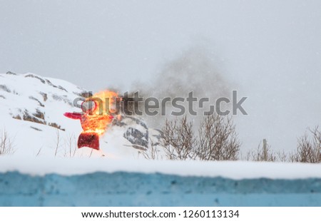 Maslenitsa feast festival celebration with burning doll of winter spirit on fire, holidays time in Russia after winter before spring season begin, traditional fun games,folk ceremonies russian culture