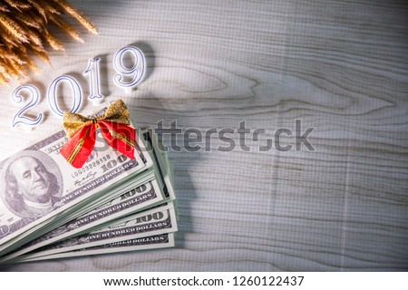 Happy New year 2019 Gift for enjoy money dollar bill in Happy bonus and Decorative Background images for New year's and Merry Christmas .