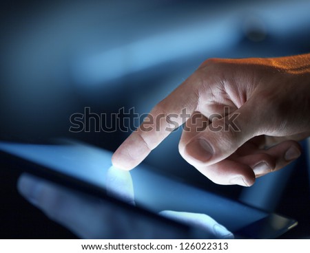 high resolution hand touching  touch pad Royalty-Free Stock Photo #126022313