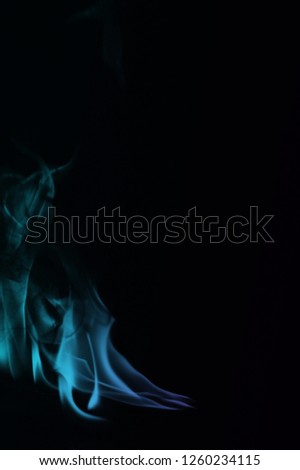 Multi Color Fire Flame Abstract on black background. A mystic colorful smoke. Blurry bright abstraction with colored lines. Magic fire - texture Image