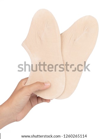 Hand holding Short socks isolated on white background