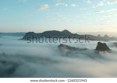 Morning in the mist Royalty-Free Stock Photo #1260321943