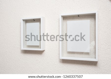 Two blank frame on white wall clean modern design