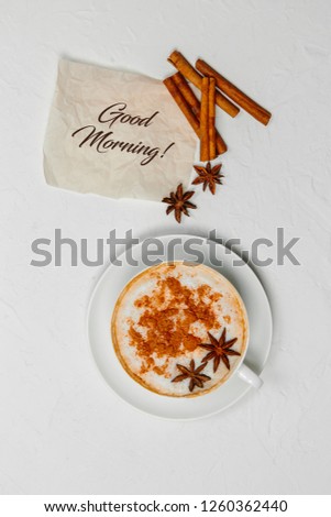 Cappuccino coffee and good morning note