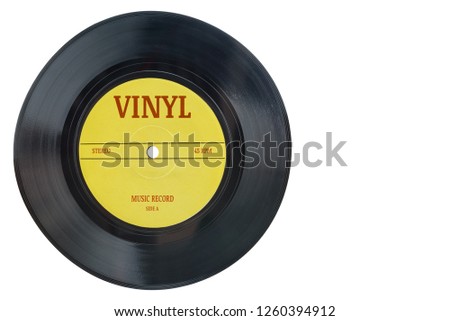 Closeup view of realistic gramophone vinyl record or phonograph record with yellow label. Black musical single play disc 7 inch 45 rpm spiral groove. Stereo sound record. Isolated on white background. Royalty-Free Stock Photo #1260394912