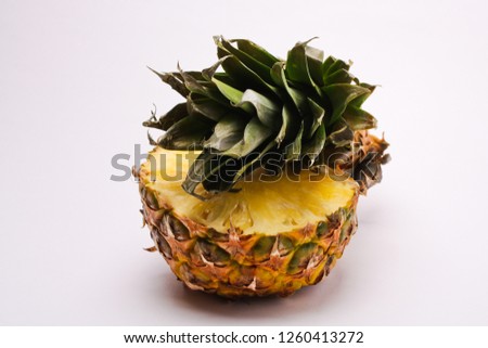 fresh pineapple on a light background
