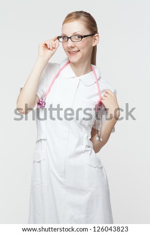 Beautiful caucasian nurse on white background