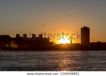 A beautiful sunset, view from across St Lawrence River in Montreal, Canada