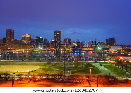 View on Baltimore skyline and Inner Harbor from Federal Hill at dusk, Maryland