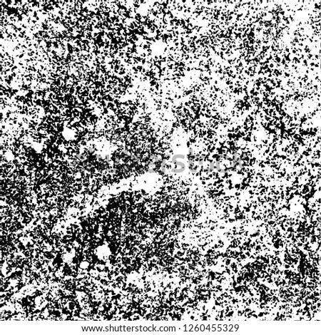 A monochrome grunge texture. Black and white abstract background