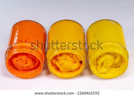 light yellow orange and yellow are warm tone color of printing screen ink in white background 

