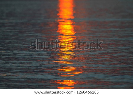 Sunrise and reflection on the sea