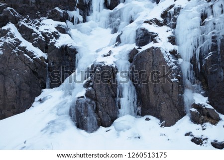 Snow covered Icelandic textures Royalty-Free Stock Photo #1260513175