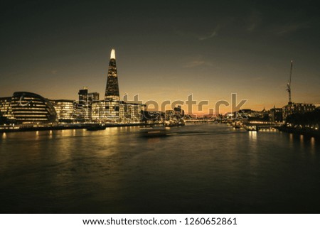 London Cityscape panorama at sunset, seen from Tower Bridge