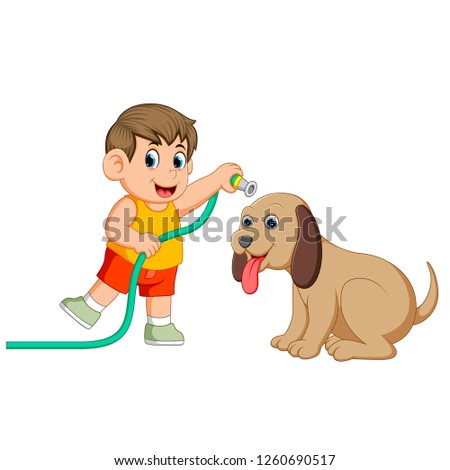 a little boy with the yellow cloth will clean his big brown dog with the pipe