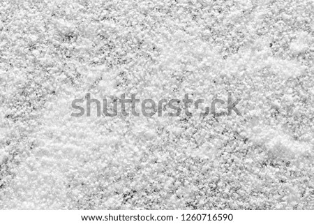 natural color of winter wonderland white snow ice on ground surface christmas new year theme pattern texture background top down details photo closeup design reference aerial above landscape view