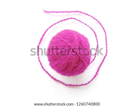 Background of wool yarn, knitted yarn, can also be used as a yarn frame. Violet or purple knitting yarn for handicrafts isolated on white background.