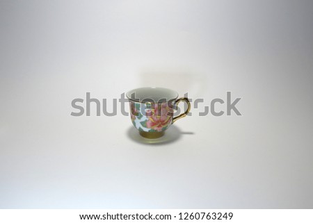 flowers pattern on tea cup vintage style                              