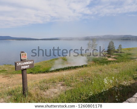 Wide scenic view of Steamboat Point with Yellowstone Lake at Yellowstone National Park in Wyoming, USA.