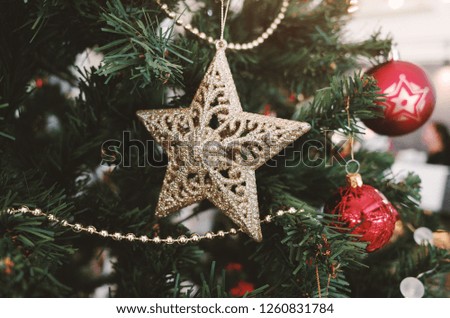 Christmas tree with ornament Star Baubles.