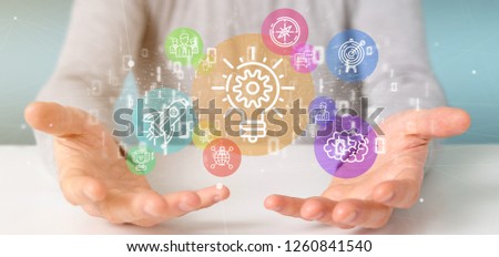 View of a Cloud of colorfull start up icon bubble with data Businessman holding a binary 3d rendering