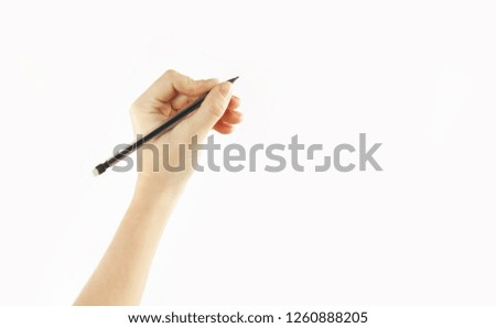
Girl's hand writes in empty space isolated on white background