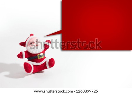 Santa claus doll isolated white background.copy space.With red square text box.