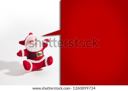 Santa claus doll isolated white background.copy space.With red side square text box.