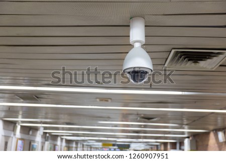 CCTV surveillance cameras entrance subway station in Seoul, Korea. 