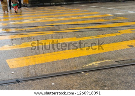 Crosswalk sign and Railroad tracksin Yangon, Myanmar