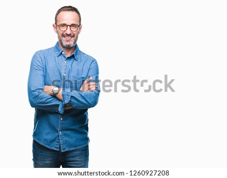 Middle age hoary senior man wearing glasses over isolated background happy face smiling with crossed arms looking at the camera. Positive person. Royalty-Free Stock Photo #1260927208