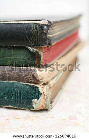 Close-up of  old books iso ated on white