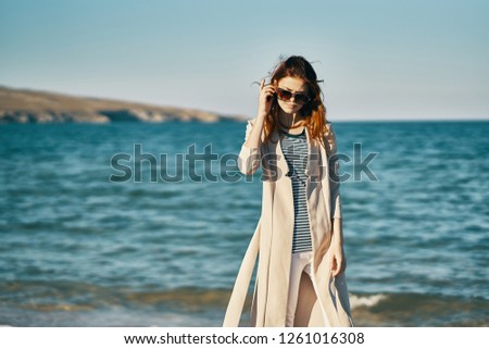 Woman outdoors on the beach                   