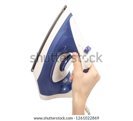 Blue iron in hand on white background isolation