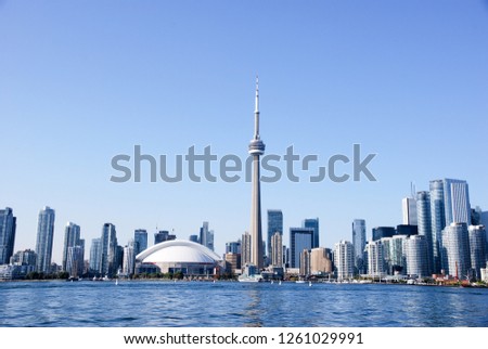 Toronto city skyline on clear sunny day from water, Ontario, Canada