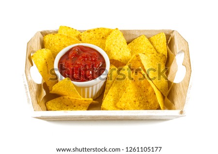 nachos and tomato dip isolated on white