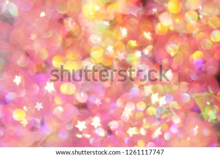 abstract blurred bokeh lights. colorful glittering shine bulbs lights background.blur of Christmas wallpaper decorations concept.xmas holiday festival backdrop,sparkle circle lit celebrations display.